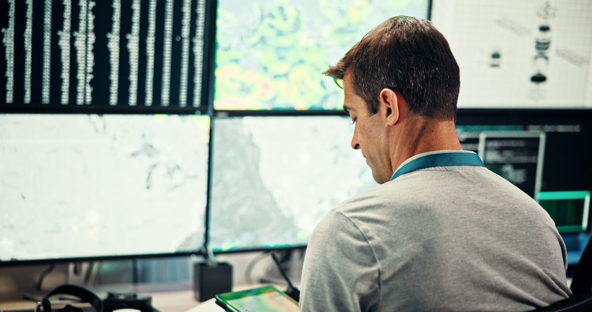 System operator monitoring a dispatch desk